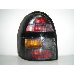 OPEL CORSA 93-* FAROLIM TRÁS ESQUERDO (FUMADO)
